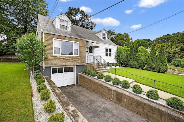130 Cresthill Rd, Yonkers, NY 10710 - cape cod house with stone siding, concrete driveway, a garage, and a front lawn