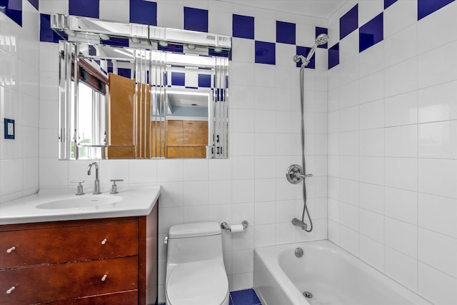 3337 Murdock Ave, Oceanside, NY 11572 - bathroom with tile walls, vanity, and shower / bathtub combination