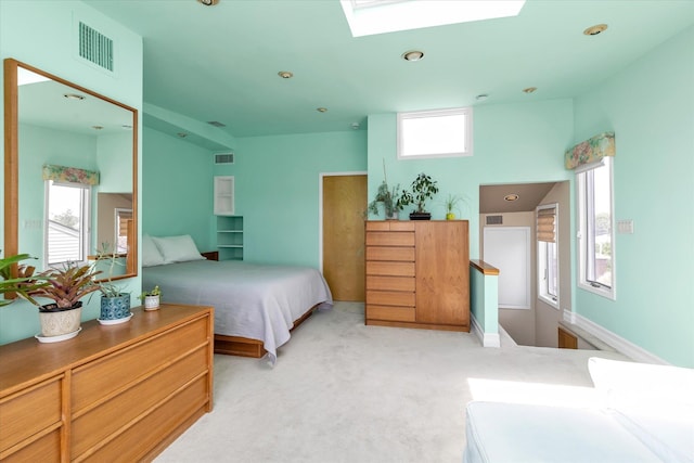 3337 Murdock Ave, Oceanside, NY 11572 - carpeted bedroom with multiple windows, a skylight, and recessed lighting