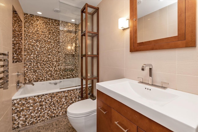 3337 Murdock Ave, Oceanside, NY 11572 - full bath with tile walls, vanity, tiled shower / bath, and tasteful backsplash
