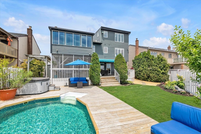 3337 Murdock Ave, Oceanside, NY 11572 - back of house featuring a hot tub, an outdoor pool, an outdoor living space, a wooden deck, and a sunroom