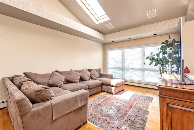 3337 Murdock Ave, Oceanside, NY 11572 - living area featuring lofted ceiling, a baseboard heating unit, a skylight, and light wood-style floors