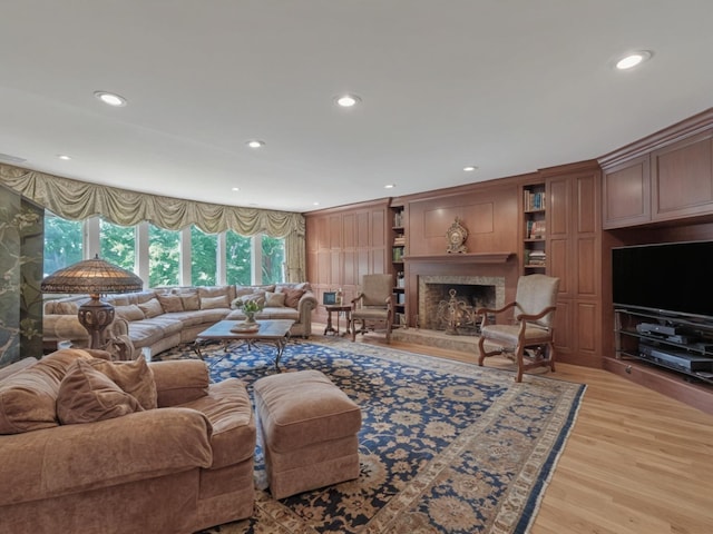 2000 Lake End Rd, Merrick, NY 11566 - living area featuring recessed lighting, a high end fireplace, and light wood-type flooring