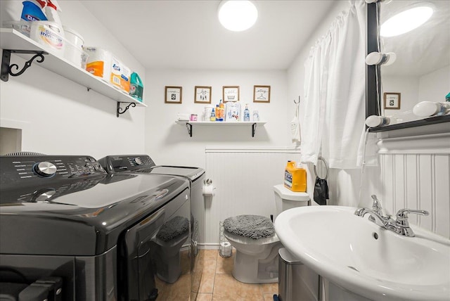 1098 Rte 311, Patterson, NY 12563 - washroom with washer and dryer, light tile patterned floors, and wainscoting