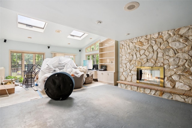 35 Stratford Ave, Dix Hills, NY 11746 - living area with a skylight, a fireplace, light colored carpet, and vaulted ceiling