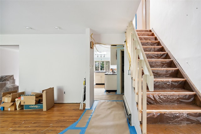 35 Stratford Ave, Dix Hills, NY 11746 - staircase featuring wood finished floors