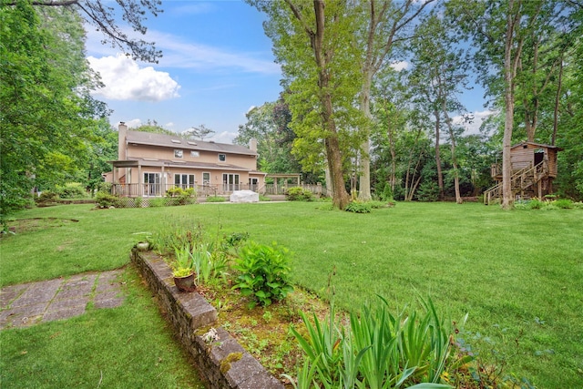 35 Stratford Ave, Dix Hills, NY 11746 - view of green lawn with a storage shed