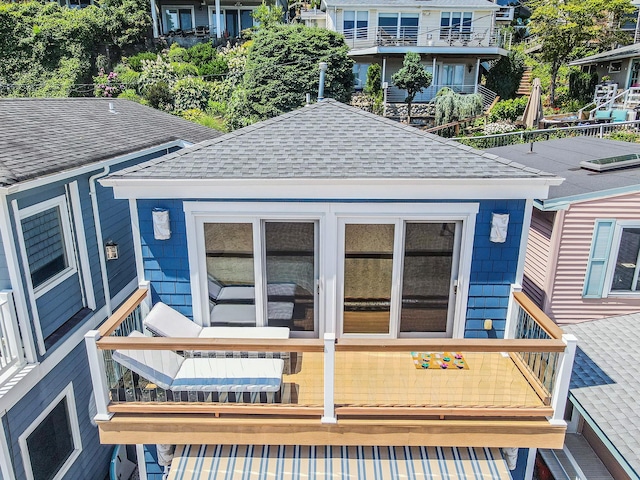 75 W Shore Rd Unit 4, Port Washington, NY 11050 - rear view of property with roof with shingles