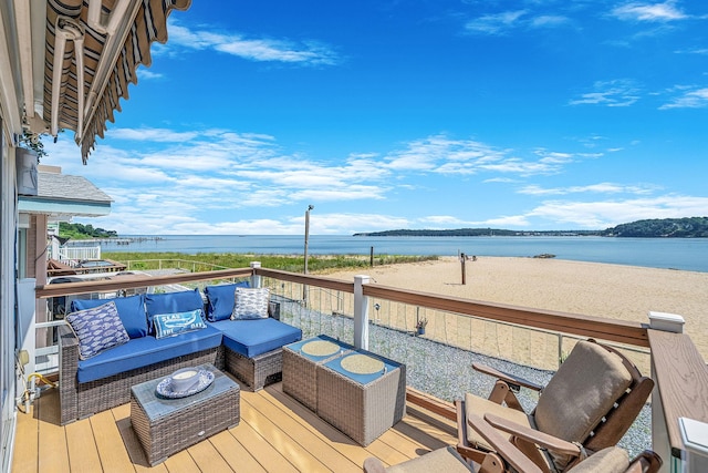 75 W Shore Rd Unit 4, Port Washington, NY 11050 - wooden deck featuring a water view and outdoor lounge area