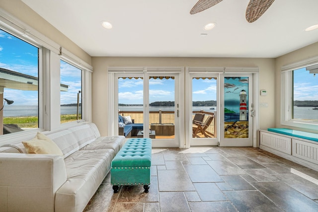 75 W Shore Rd Unit 4, Port Washington, NY 11050 - sunroom featuring plenty of natural light, recessed lighting, and stone tile flooring