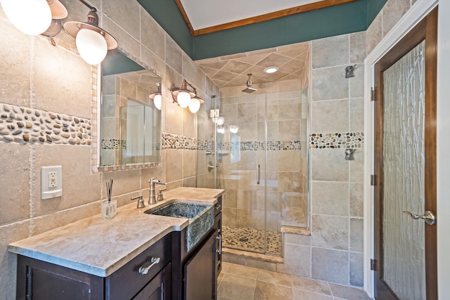 75 W Shore Rd Unit 4, Port Washington, NY 11050 - bathroom featuring vanity, a stall shower, and tile walls