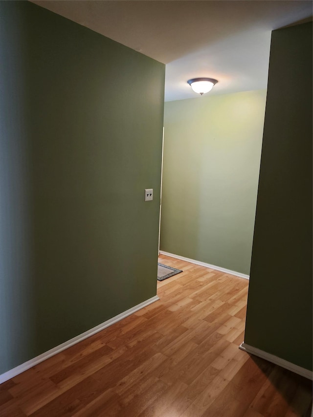 108 Village Rd Unit B, Jefferson Valley, NY 10598 - empty room featuring wood finished floors and baseboards