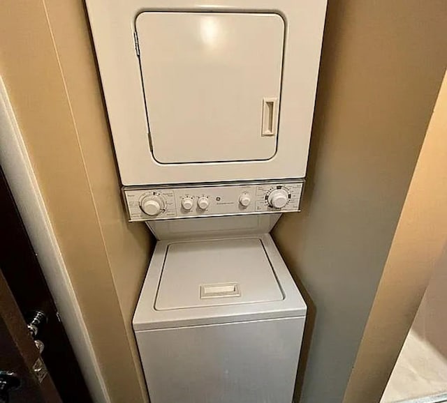 108 Village Rd Unit B, Jefferson Valley, NY 10598 - laundry room with stacked washer and clothes dryer
