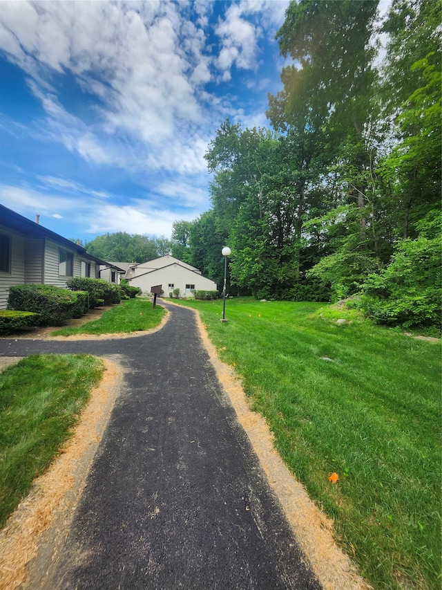 108 Village Rd Unit B, Jefferson Valley, NY 10598 - view of front of property featuring a front lawn