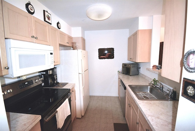 200 Woodcrest Ln Unit 222, Mount Kisco, NY 10549 - kitchen with stainless steel appliances, light countertops, and light brown cabinetry