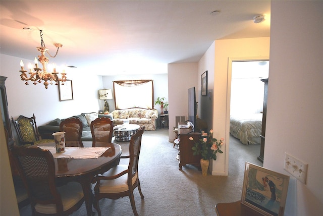 200 Woodcrest Ln Unit 222, Mount Kisco, NY 10549 - carpeted dining area with a chandelier