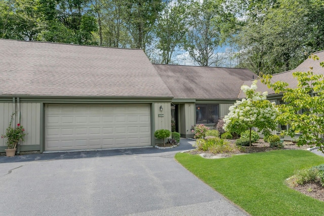 623 Heritage Hls Unit B, Somers, NY 10589 - view of front of home with a garage, asphalt driveway, board and batten siding, and a shingled roof