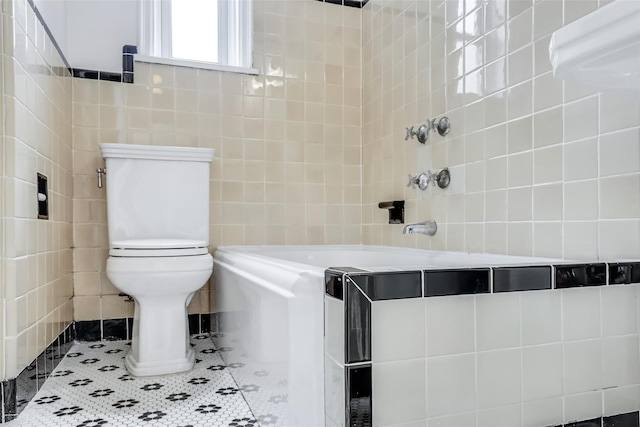 48-55 43rd St Unit 4H, Woodside, NY 11377 - full bathroom featuring tile walls, tile patterned flooring, a tub, and a shower