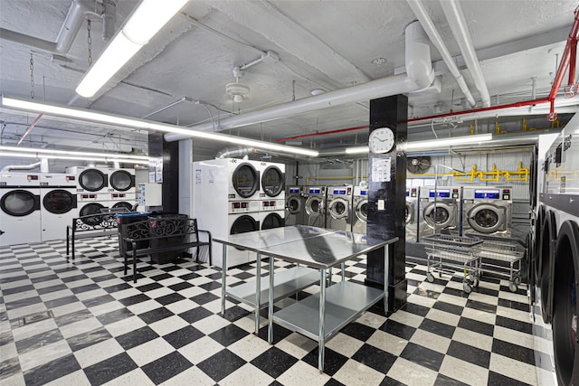 48-55 43rd St Unit 4H, Woodside, NY 11377 - communal laundry room featuring stacked washer and clothes dryer, washer and clothes dryer, and tile patterned floors