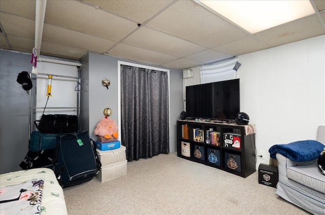 10719 Sutter Ave, Ozone Park, NY 11417 - finished below grade area featuring a paneled ceiling and carpet floors