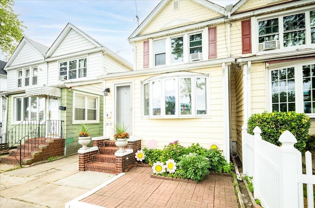 10719 Sutter Ave, Ozone Park, NY 11417 - view of front of house with a patio
