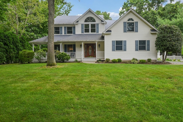 5 Aspen Cir, Saint James, NY 11780 - view of front facade featuring a porch, a front yard, and roof with shingles