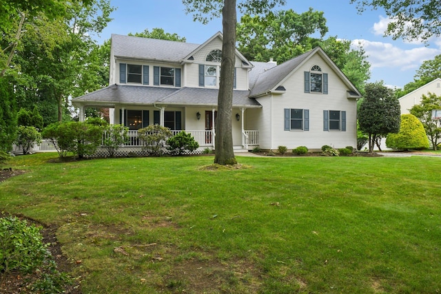 5 Aspen Cir, Saint James, NY 11780 - view of front facade with covered porch, a front lawn, and a shingled roof