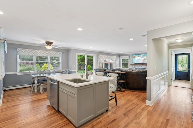5 Aspen Cir, Saint James, NY 11780 - kitchen featuring gray cabinetry, dishwasher, light wood-style flooring, a baseboard radiator, and healthy amount of natural light