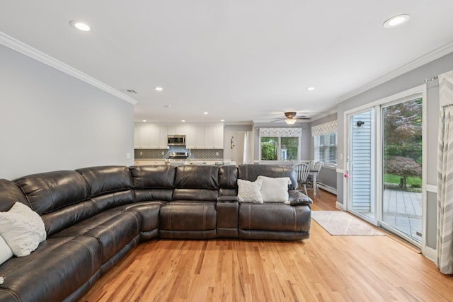 5 Aspen Cir, Saint James, NY 11780 - living room featuring recessed lighting, plenty of natural light, light wood-style floors, ornamental molding, and a ceiling fan