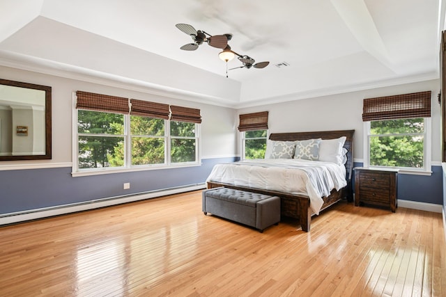 5 Aspen Cir, Saint James, NY 11780 - bedroom with a tray ceiling, a baseboard radiator, wood-type flooring, and ceiling fan