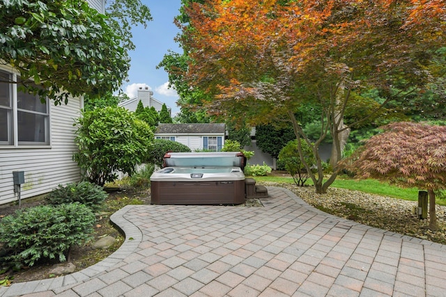 5 Aspen Cir, Saint James, NY 11780 - view of patio / terrace featuring a hot tub and a shed
