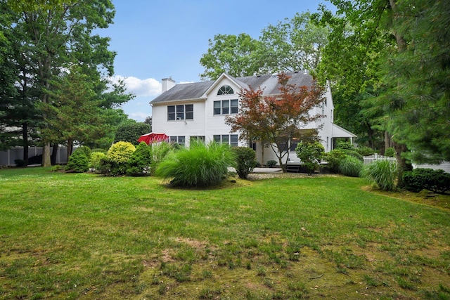 5 Aspen Cir, Saint James, NY 11780 - view of front of property featuring a chimney