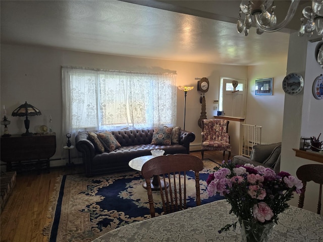 27 Leo Ln, Deer Park, NY 11729 - living area with wood finished floors and a chandelier