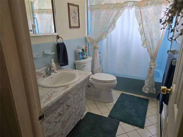 27 Leo Ln, Deer Park, NY 11729 - full bathroom featuring vanity, shower / tub combo, tile patterned floors, tile walls, and wainscoting