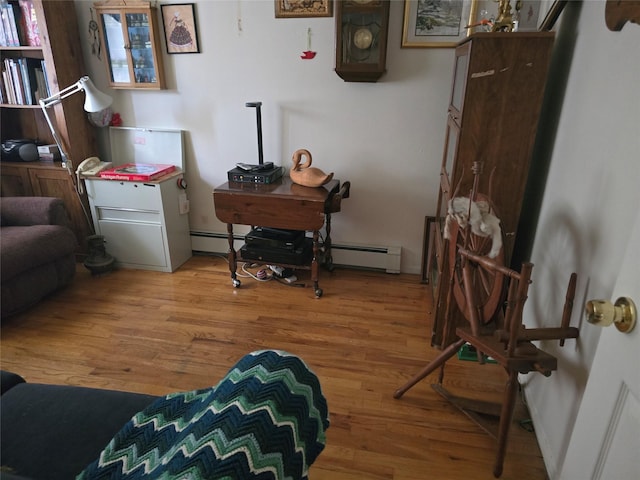 27 Leo Ln, Deer Park, NY 11729 - sitting room featuring light wood-type flooring and baseboard heating