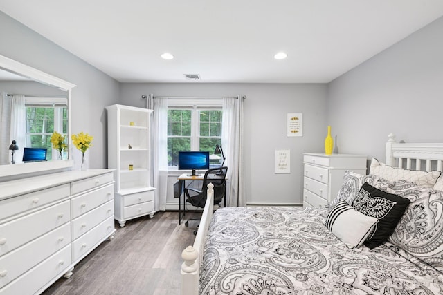23 Alpine Way S, Huntington, NY 11746 - bedroom featuring multiple windows, dark wood-style flooring, and recessed lighting