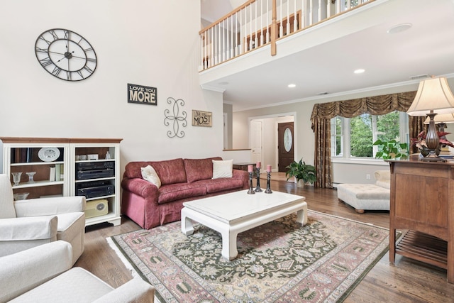23 Alpine Way S, Huntington, NY 11746 - living room with crown molding, wood finished floors, a towering ceiling, and recessed lighting