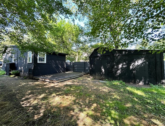 36 River St, Livingston Manor, NY 12758 - view of yard featuring a storage unit and a deck