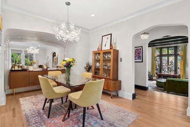 90-01 68th Ave, Forest Hills, NY 11375 - dining area with arched walkways, a chandelier, light wood-style flooring, ornamental molding, and recessed lighting