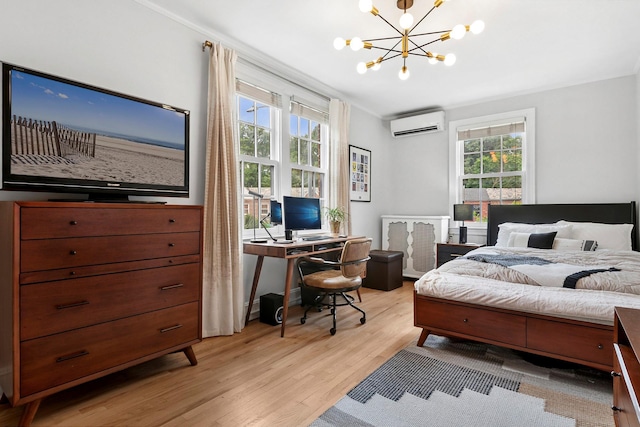 90-01 68th Ave, Forest Hills, NY 11375 - bedroom featuring a wall unit AC, a chandelier, light wood-style flooring, and an office area