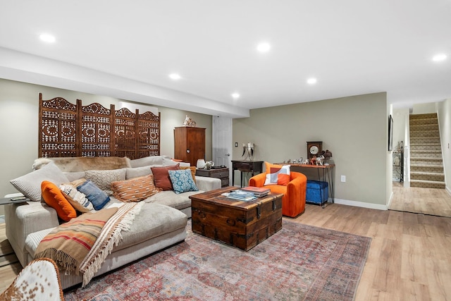 90-01 68th Ave, Forest Hills, NY 11375 - living room featuring wood finished floors, stairs, and recessed lighting