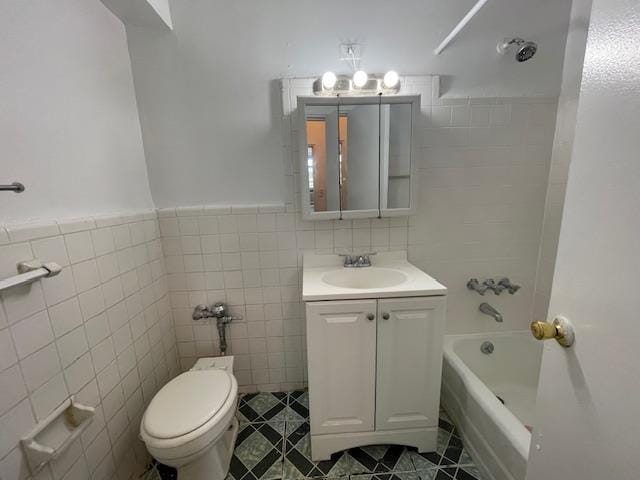 108-49 63rd Ave Unit Lc, Forest Hills, NY 11375 - full bath featuring tile walls, vanity, shower / bath combination, and tile patterned flooring