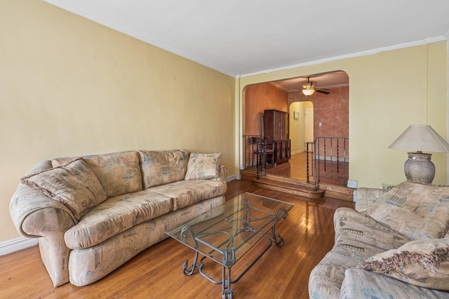 306 E Mosholu Pkwy S Unit 3D, Bronx, NY 10458 - living area with arched walkways, wood finished floors, ornamental molding, and a ceiling fan