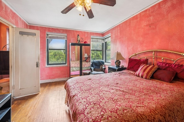 306 E Mosholu Pkwy S Unit 3D, Bronx, NY 10458 - bedroom featuring hardwood / wood-style floors, ceiling fan, and crown molding