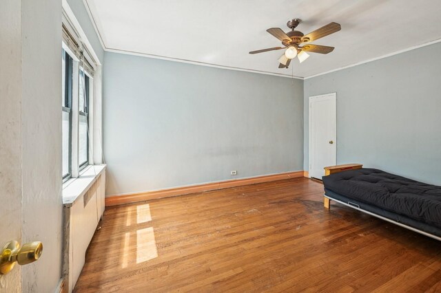 306 E Mosholu Pkwy S Unit 3D, Bronx, NY 10458 - unfurnished bedroom with wood finished floors, a ceiling fan, and crown molding