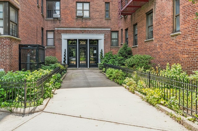 306 E Mosholu Pkwy S Unit 3D, Bronx, NY 10458 - property entrance featuring brick siding and cooling unit
