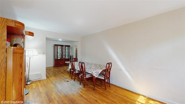 2190 Brigham St Unit 4B, Brooklyn, NY 11229 - dining room featuring light wood-type flooring and baseboards