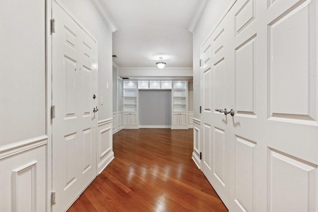 257 Central Ave Unit 1D, White Plains, NY 10606 - hall with ornamental molding, dark wood-type flooring, and a decorative wall