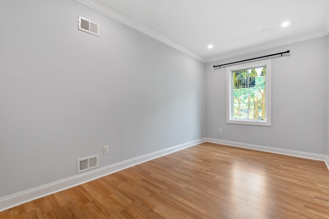 257 Central Ave Unit 1D, White Plains, NY 10606 - spare room featuring crown molding, light wood-style floors, and recessed lighting