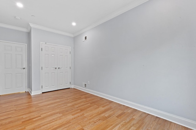 257 Central Ave Unit 1D, White Plains, NY 10606 - spare room featuring ornamental molding, light wood-type flooring, a smoke detector, and recessed lighting